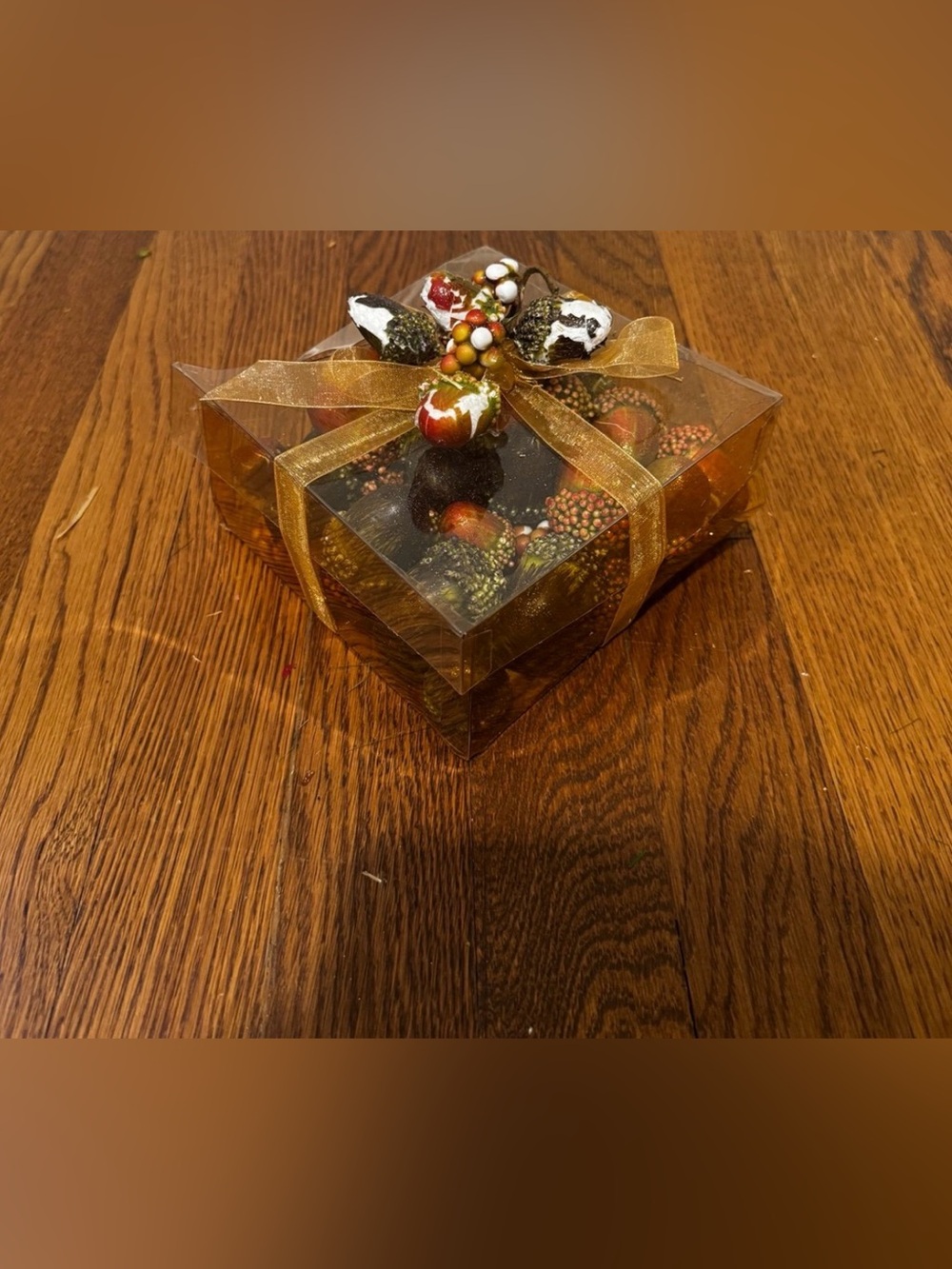 Festive Gold Holiday Gift Box with Decorative Accents